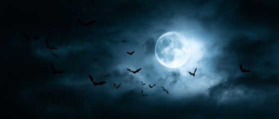 Obraz premium Bats flying against full moon in night sky