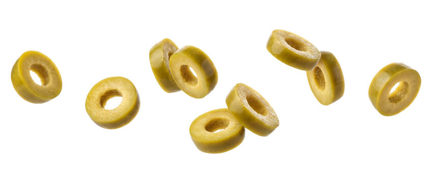 Falling sliced green olives isolated on transparent background