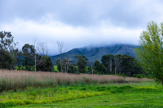 Klein River and Klein Mountains, Stanford, South Africa on a misty dark morning