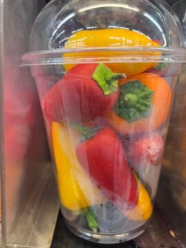 Autumn harvest.mini pepper shaker in store plastic package.storage and sale,agriculture.Pepper harvested and collected in baskets at farm market.Vegetables and fruits