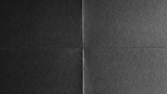 Minimalist black paper texture with crease lines background