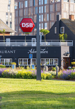 DSB train station sign by Copenhagen waterfront restaurant
