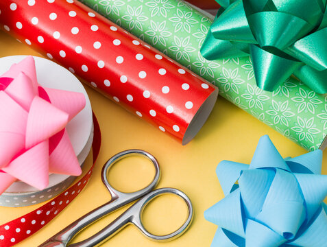 Overhead View of Gift Wrapping Accessories and Metal Scissors