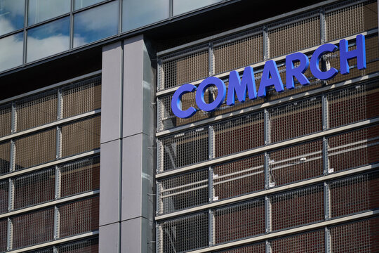 Comarch corporate logo on the modern industrial style building facade in Gdansk, Poland