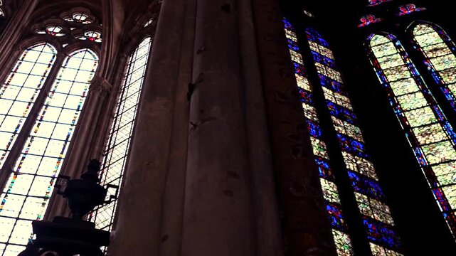 Colorful gothic stained glass windows inside Amiens Cathedral in France