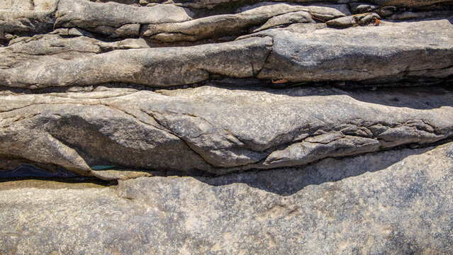 Smooth eroded stone slab surface texture background