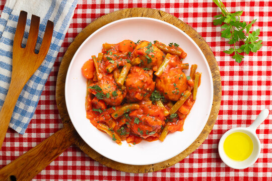 Meatballs with tomato and vegetable sauce. Overhead view of the table. 