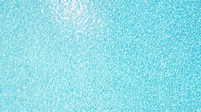 Bright turquoise swimming pool water surface rippling gently under direct summer sunshine creating sparkling light reflections across entire flat horizontal background frame