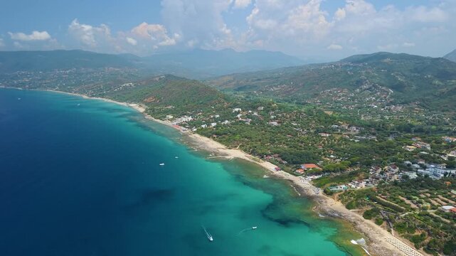 Capo Palinuro Cilento Italy 4K drone video. High altitude panorama of bay town beaches and marina revealing cape promontory. Scenic travel b roll stock footage