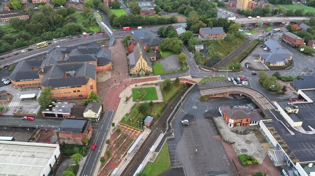 Aerial video of King Street Tram Stop and Railway Line Infrastructure in Oldham, Greater Manchester. 
