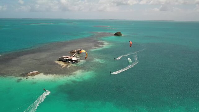 Aerial view of kitesurfers in Los Roques archipelago, Venezuela.