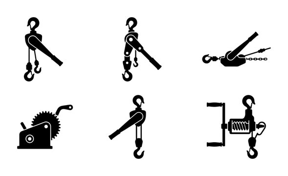 Collection of hoists and winches on white background