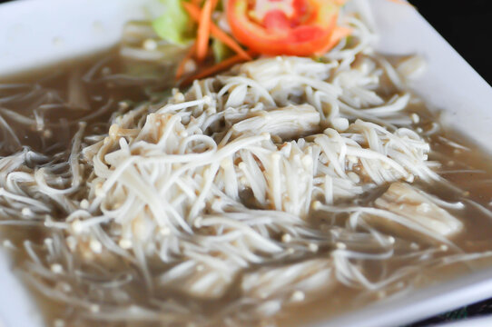 stir fried mushroom  , stir fried golden needle mushroom or enoki mushroom or   Flammulina filiformis or flammulina valutipes