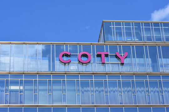 Coty logo, signage on the facade of Coty Eastern Europe office, American beauty product supplier company. WARSAW, POLAND - AUGUST 8, 2026