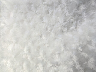 Soft white fluffy fur fabric texture background © Koharu