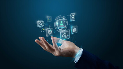 Obraz premium Professional businessman showing futuristic digital interface floating above palm.