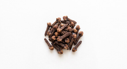 Fototapeta premium Natural organic clove spice buds for dental care, mulled wine, and traditional medicine
