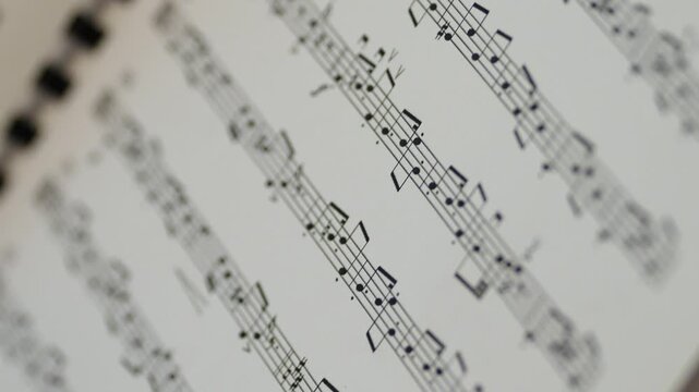 Classical music sheet music arranged on a vintage music stand, featuring elegant musical notes and traditional notation. The composition creates a timeless and soph