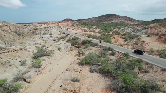 Aerial view of arid landscape and road in Araya, Venezuela.