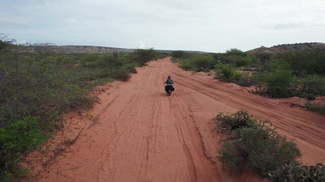 Aerial view of a dirt road in the arid landscape of Venezuela.