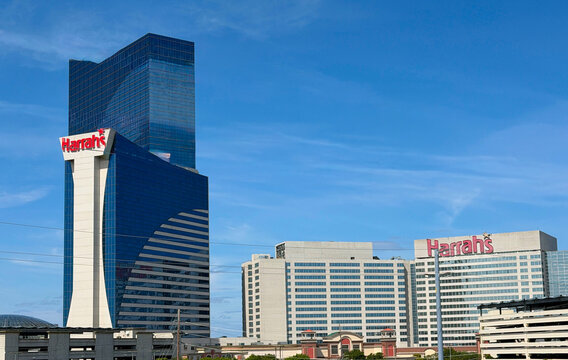 Atlantic City, New Jersey, USA, September 12, 2026, Harrah's casino and hotel tower in Atlantic City with reflective blue glass facade rising above the city.