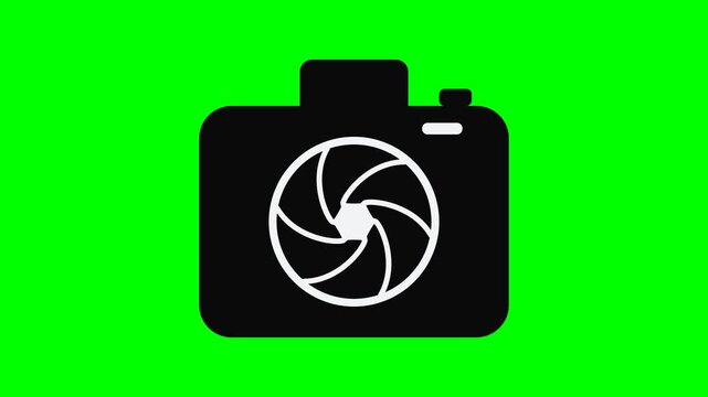 Standalone CAMERA animation on solid chroma GREEN background: black camera body with top hump, button and white slot; lens holds a TRUE APERTURE IRIS like the blade reference. The white swirl seams fo