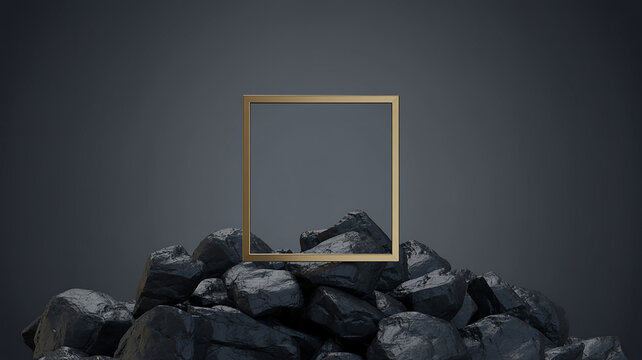 Gold square frame on pile of dark rocks gold frame