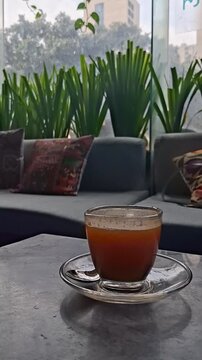 cup of warm tea  with smoke arising  from