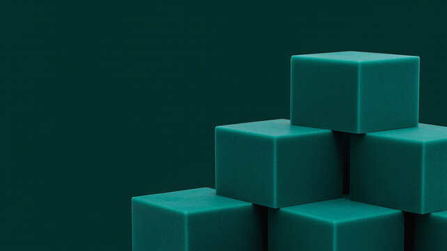 Teal green cubes stacked in a pyramid against a dark teal background