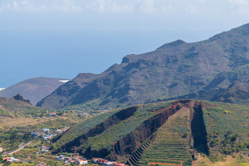 Fototapeta premium The El Palmar valley in the Teno Rural Park, located in the northwest of the island of Tenerife, in the Canary Islands Dangerous Winding Road with Views to Masca Valley Tenerife Canary islands Spain
