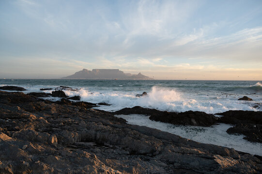 Scenic seascape of Blouberg beach with Table Mountain in the background in the late evening