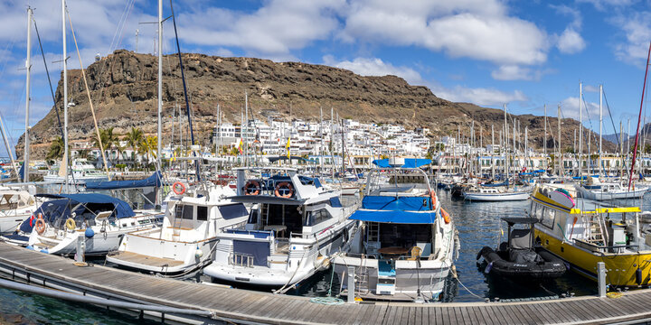 Gran Canaria island boats in Puerto de Mogan port harbor marina on Canary Islands panorama holiday in Spain