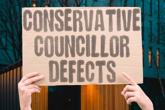 "Conservative Councillor Defects" Local politician switches from right to centrist party. POLITICAL. PARTY. DEFECTION. LOCAL. REALIGNMENT.