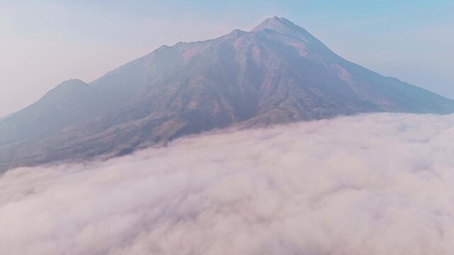 Aerial view of Mount Merapi above the clouds, Indonesia.