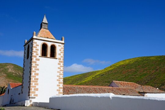 Santa Maria church tower with pretty countryside in the Springtime, Betancuria, Fuerteventura, Canary Islands, Spain, Europe