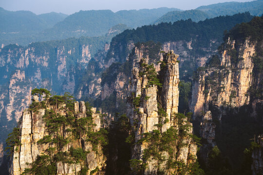 Scenic sandstone rock formations rise above the forest in Zhangjiajie National Forest Park China
