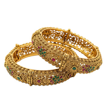 luxurious gold bangles with intricate filigree design and colorful gemstone inlays