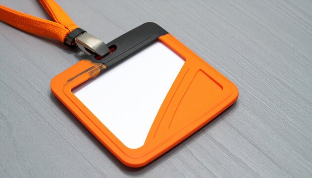 Orange plastic ID card sleeve with white insert and matching fabric lanyard for conference personnel