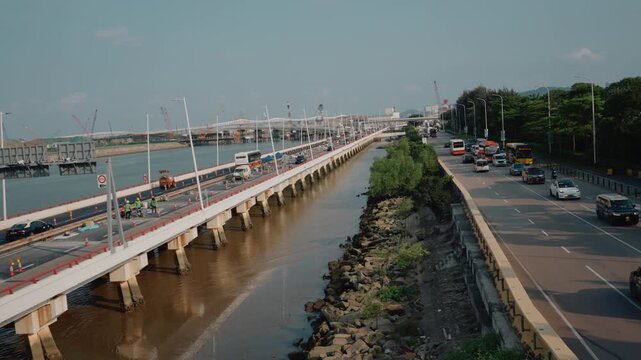 Macau Bridge, Ponte Macau, Macau, Macao, China, bridge, road bridge, urban bridge, waterway, channel, roadway, road, highway, multi-lane road, traffic, heavy traffic, vehicles, transportation, infrast