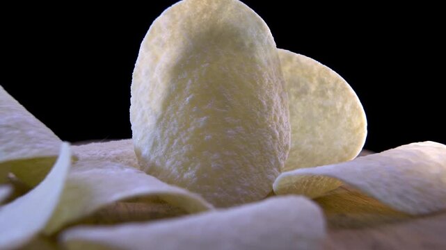 Curved Potato Crisps Showing Three-Dimensional Shapes, Low Angle