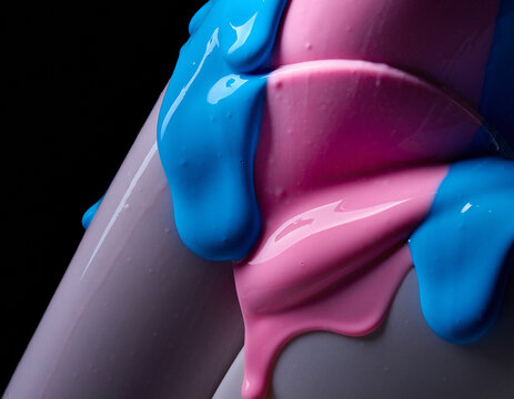 Macro View of Thick Viscous Pink and Blue Liquid Dripping over Geometry