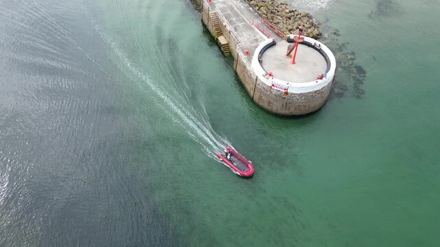 High Angle Footage of Beach and Ocean of Looe Town at River and Beach During Hot Sunny Day June 29th, 2025. Looe is a coastal town and civil parish in southeast Cornwall, England, United Kingdom.