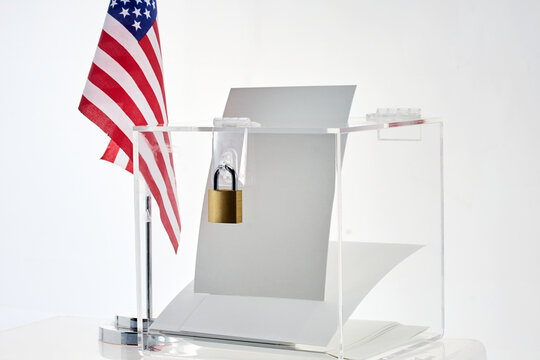 Us flag with locked ballot box representing election security