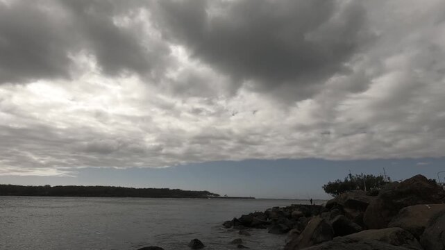 storm clouds over water