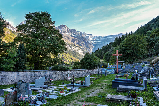 The church Notre Dame du Bon Port with cemetery in the mountain village Gavarnie-Gedre in Hautes-Pyrenees, France.