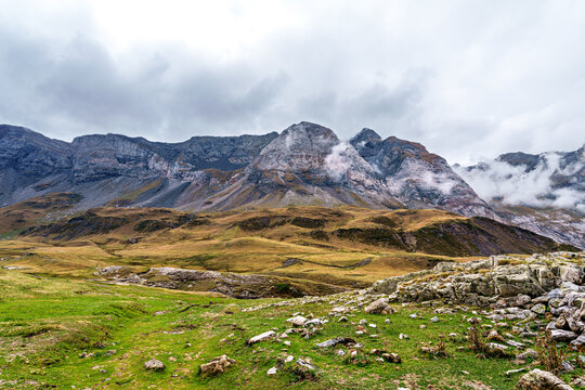 Hiking trail in Cirque de Troumouse at Heas in the Hautes-Pyrenees department in France, forming the border with Spain