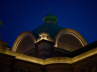 Domed neoclassical building with arched windows lit at night Seoul © walk.and.look