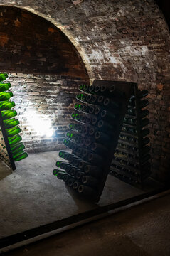 Champagne cellars in Epernay, underground chalk tunnels with systematic bottle storage and aging facilities, wine making industrial production and historical infrastructure, Champagne, France.