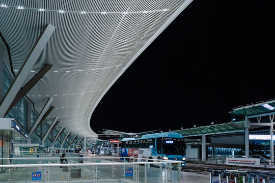 September 11, 2026, Incheon, South Korea - Blue airport bus at Incheon International Airport Terminal 2 at night