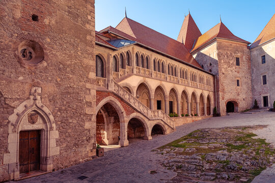 Arcaded staircase and courtyard facade inside Corvin Castle in Hunedoara Transylvania Romania